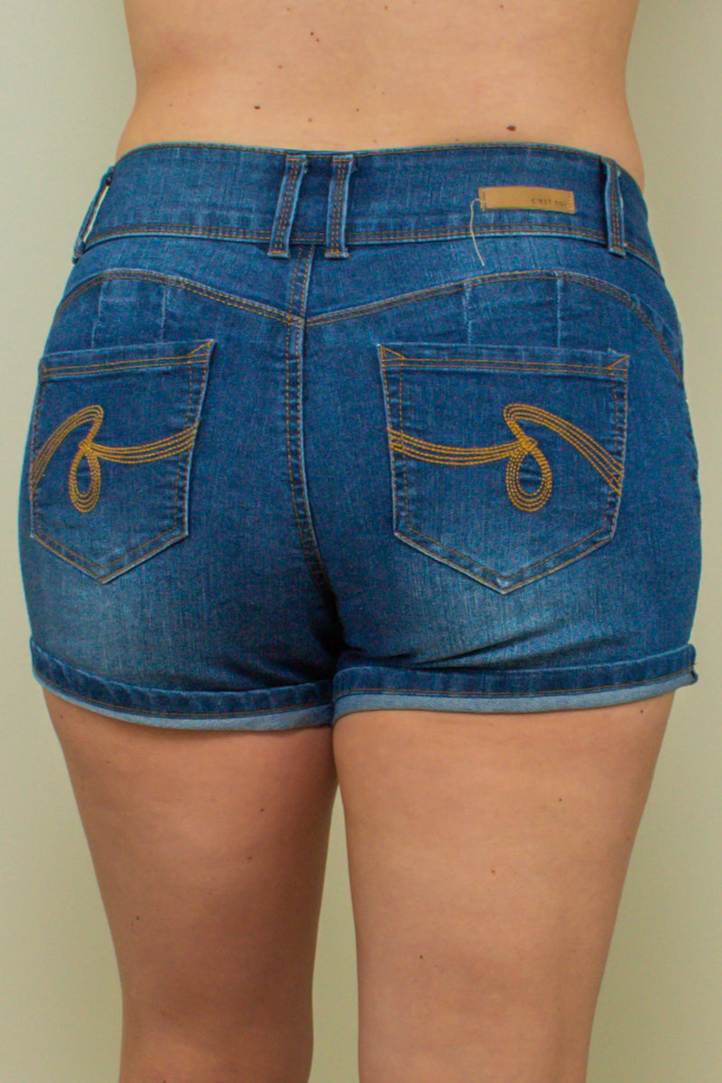 medium-rise dark wash cuffed denim jeans, back view